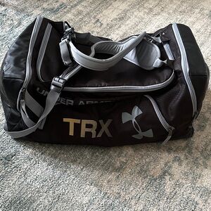 Under Armour Black Duffel convertible backpack.